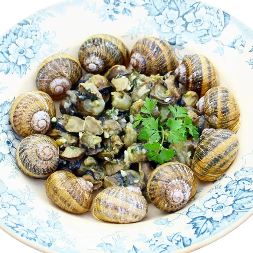 Preparazione delle lumache trifolate in padella
